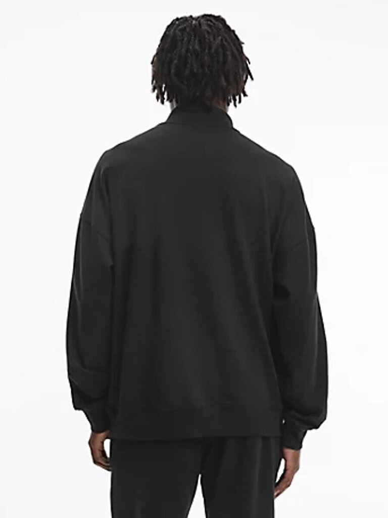 Huppari CALVIN KLEIN Quarter Zip Black 000NM2299EUB1 hinta ja tiedot | Miesten neuleet ja villapaidat | hobbyhall.fi