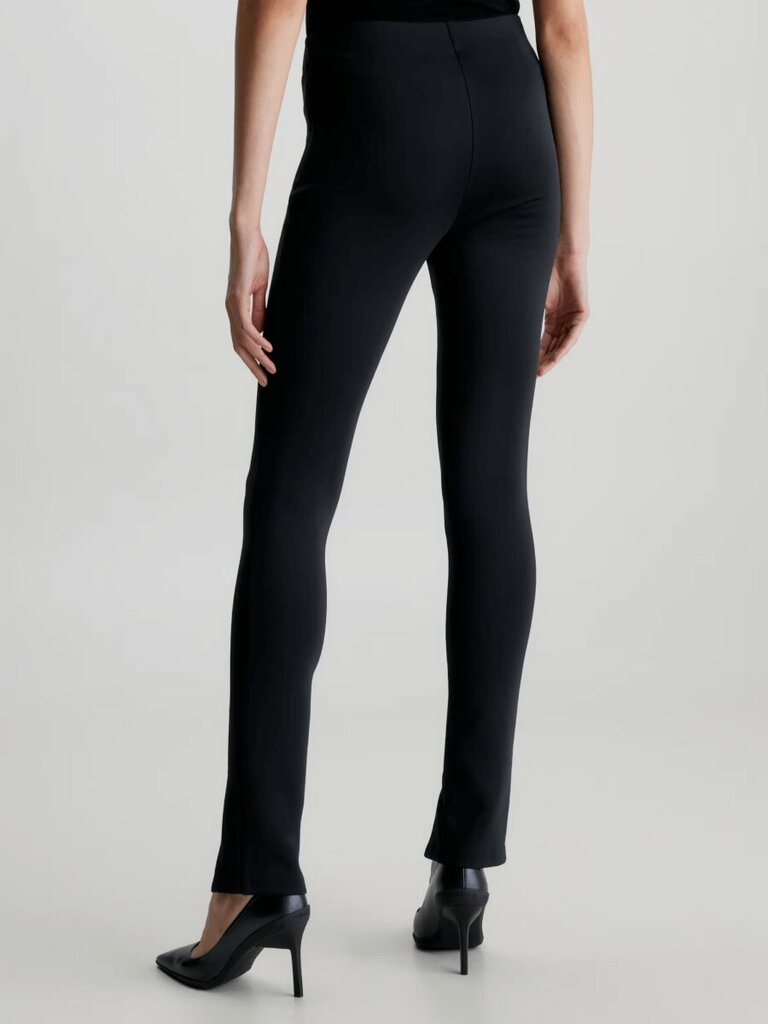 Leggingsit CALVIN KLEIN Technical Knit Black K20K205357BEH hinta ja tiedot | Naisten vapaa-ajan housut | hobbyhall.fi