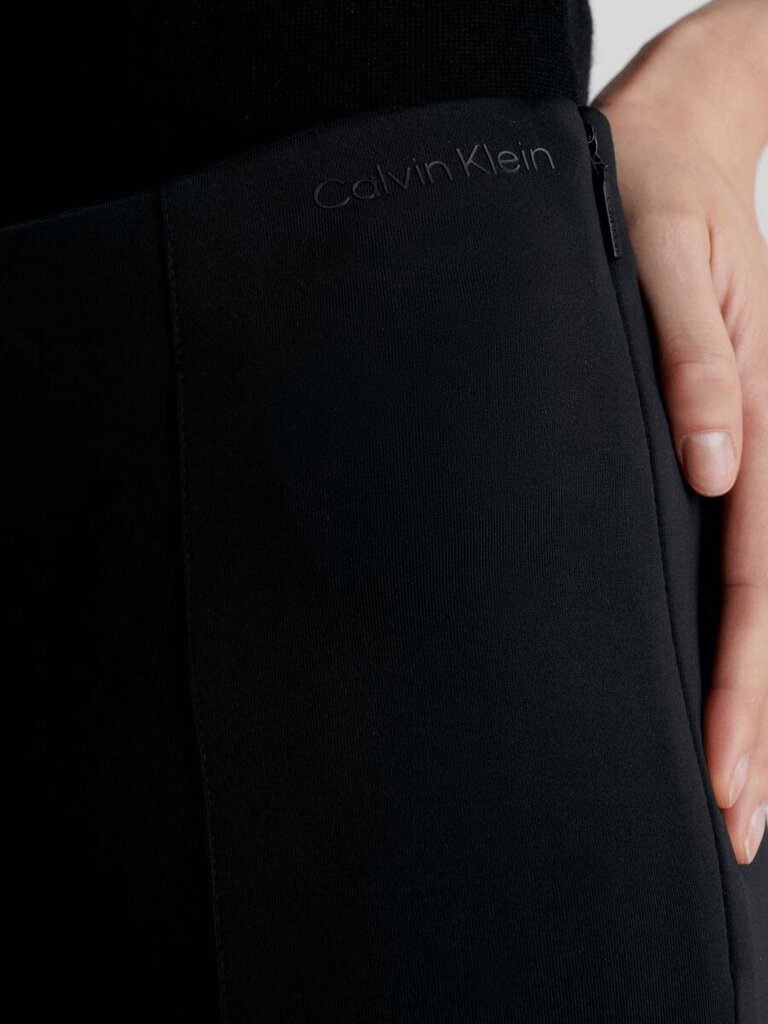 Leggingsit CALVIN KLEIN Technical Knit Black K20K205357BEH hinta ja tiedot | Naisten vapaa-ajan housut | hobbyhall.fi