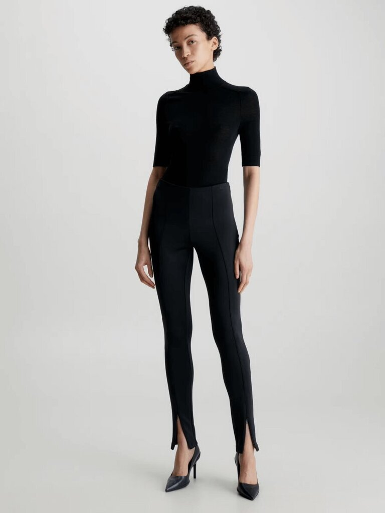 Leggingsit CALVIN KLEIN Technical Knit Black K20K205357BEH hinta ja tiedot | Naisten vapaa-ajan housut | hobbyhall.fi