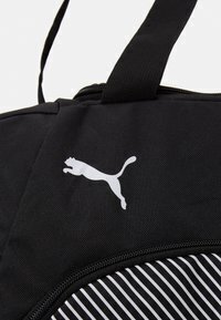 Urheilulaukku Puma Training Sports bag S Black hinta ja tiedot | Urheilukassit ja reput | hobbyhall.fi