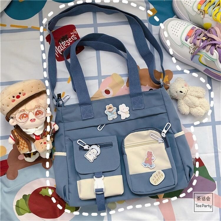 BlueBag Badge Cat-2024 Uusi, isokokoinen kangaskassi Naispuolisille japanilaisille opiskelijoille, olkalaukku, monipuolinen kampuslaukku hinta ja tiedot | Tietokonelaukut | hobbyhall.fi