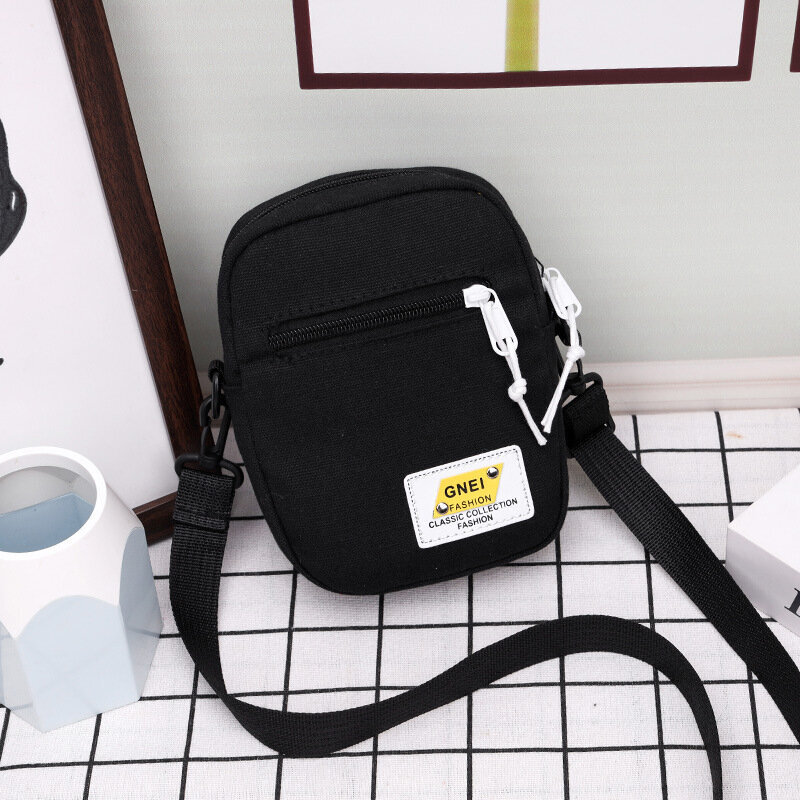 Musta 2024 Canvas Naisten Crossbody Laukku Trend Pieni Olkalaukku Korean Yksivärinen Opiskelija Puhelinlaukku Yksinkertainen Vetoketjullinen Kukkaro hinta ja tiedot | Tietokonelaukut | hobbyhall.fi