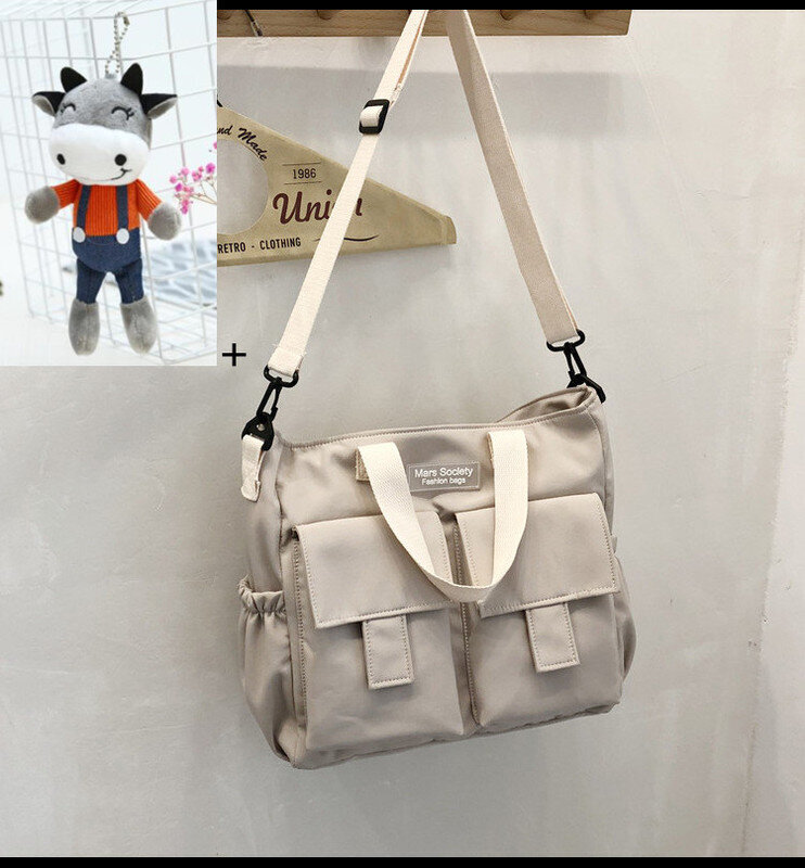 Beige Cow-Harajuku Nuorten Miesten Olkalaukku Suuri Tilavuus Käsilaukut Crossbody Laukut naisille Messenger Bag Opiskelijatytöt Koululaukut Bolsas hinta ja tiedot | Tietokonelaukut | hobbyhall.fi