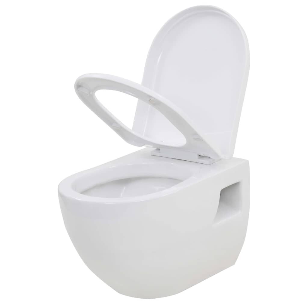 vidaXL Seinään kiinnitettävä WC-istuin keraaminen valkoinen hinta ja tiedot | WC-istuimet | hobbyhall.fi