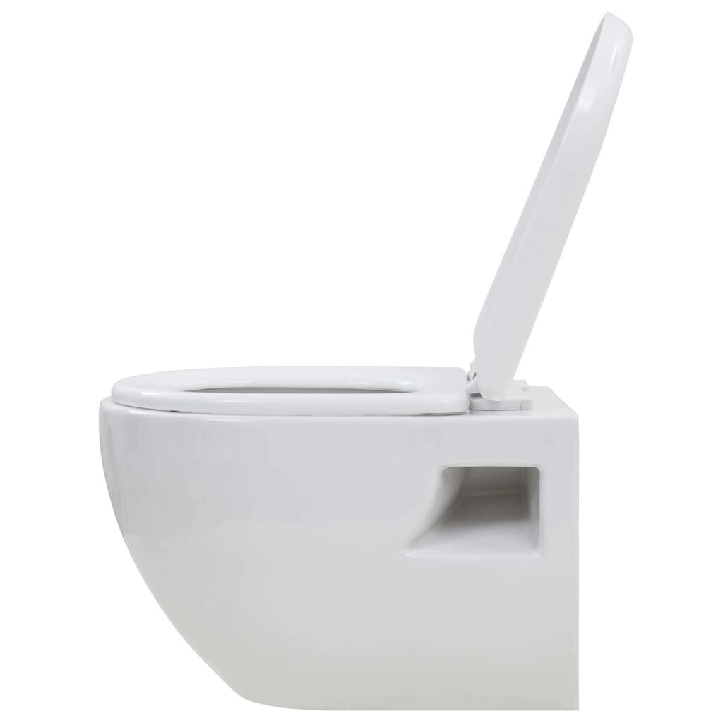 vidaXL Seinään kiinnitettävä WC ja piilotettu säiliö keramia valkoinen hinta ja tiedot | WC-istuimet | hobbyhall.fi