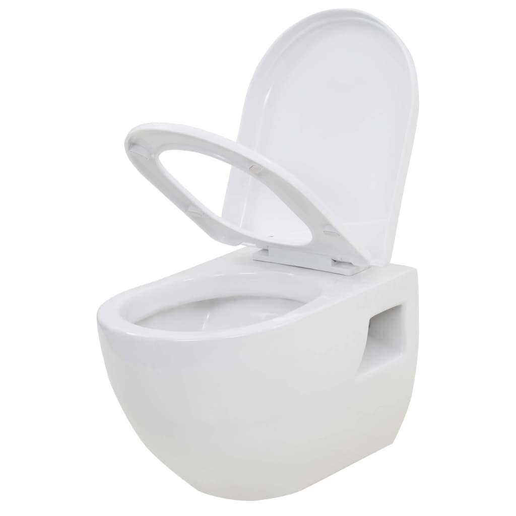 vidaXL Seinään kiinnitettävä WC ja piilotettu säiliö keramia valkoinen hinta ja tiedot | WC-istuimet | hobbyhall.fi