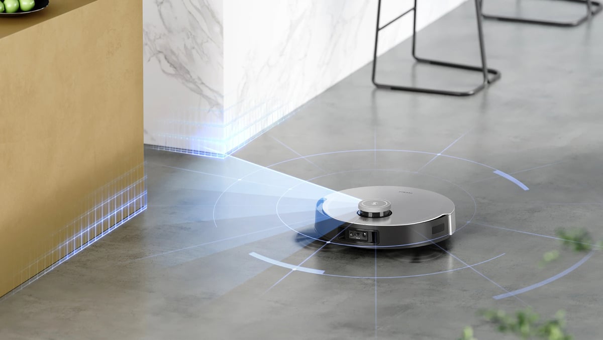 An image illustrating the TrueMapping 2.0 technology of the Ecovacs Deebot X1 Omni robotic vacuum cleaner near bar stools and a kitchen island