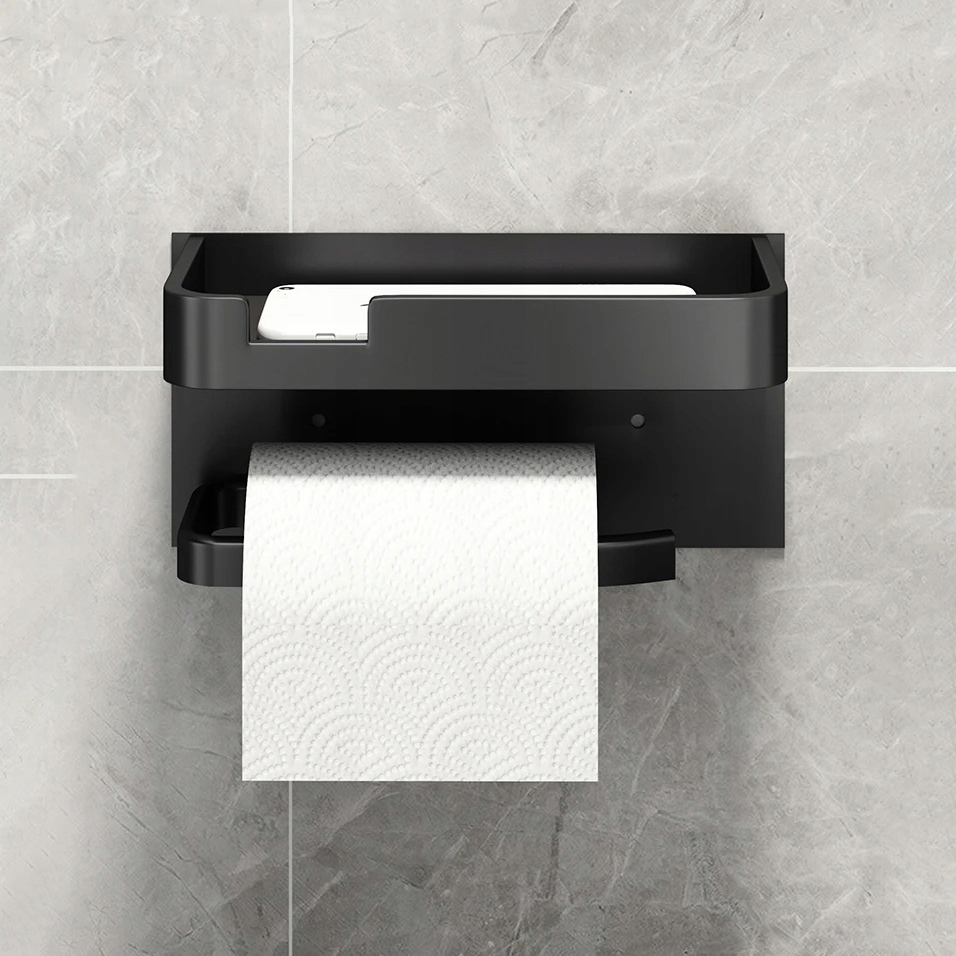 Musta wc-paperiteline hyllyllä, metallia, tahmeaa, vahvaa liimaa Eri merkkejä